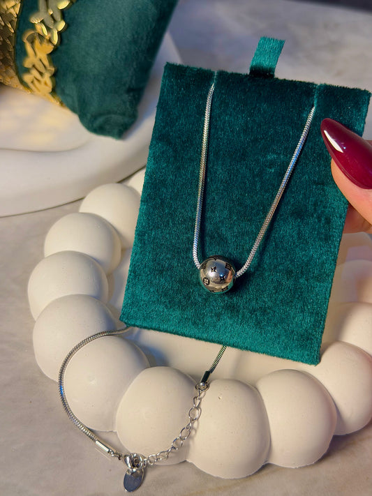 Silver Ball Necklace with Luxury-Inspired Print Design