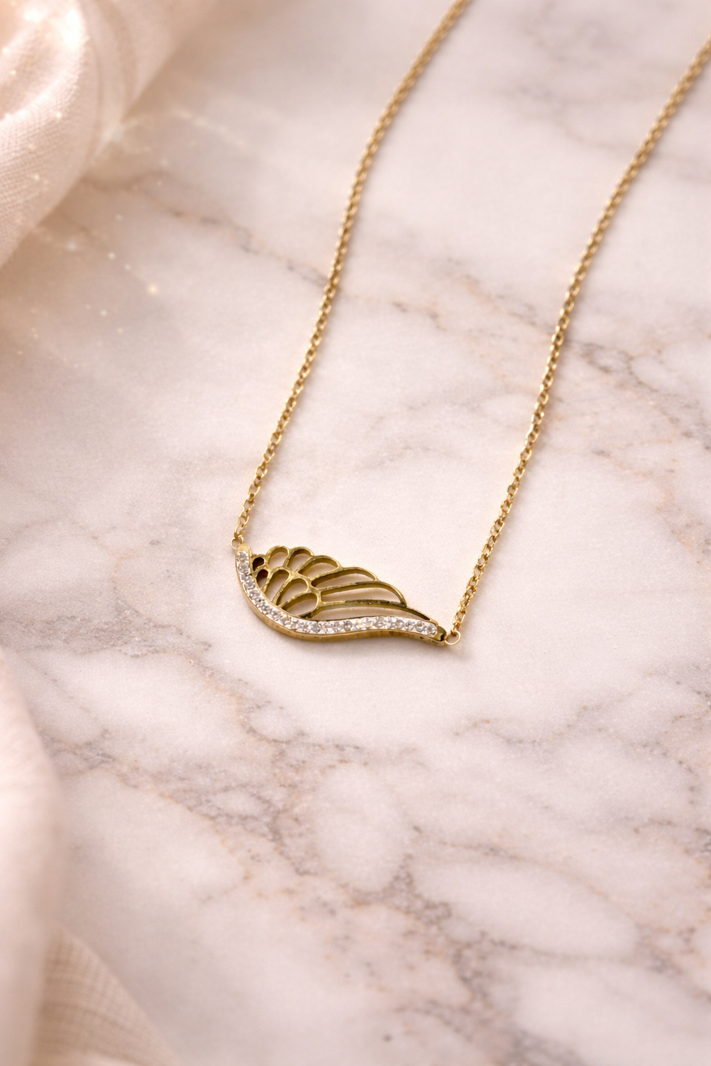 Elegant Golden Feather Necklace with Sparkling Rhinestones