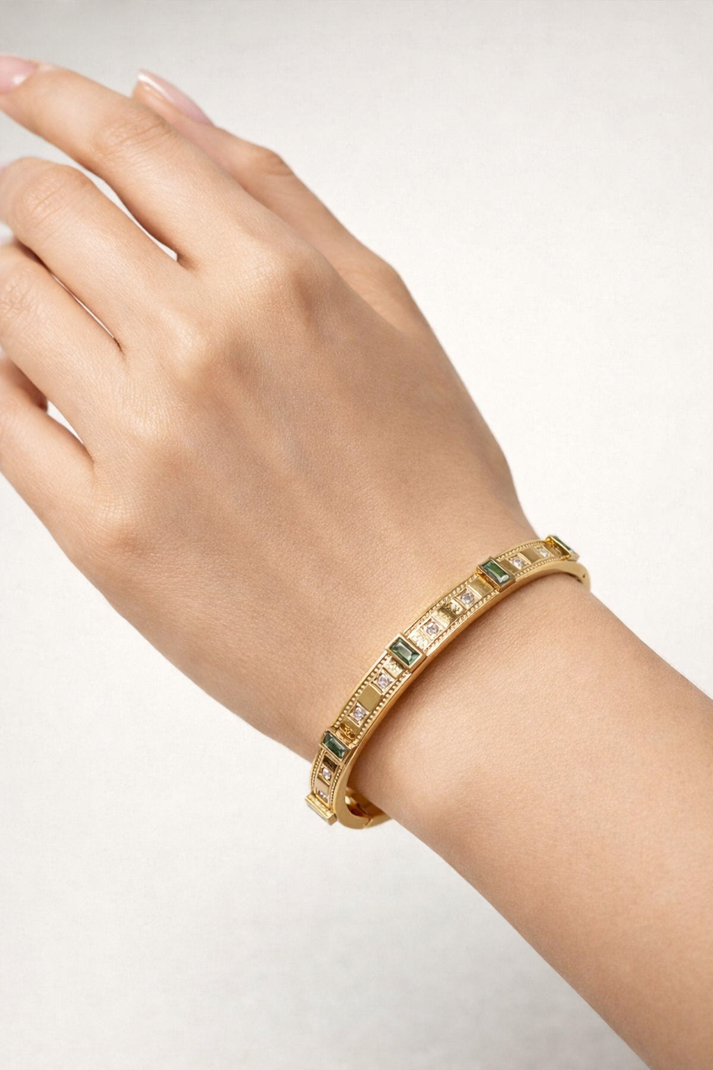 Elegant Gold Bangle with Sparkling Green Crystals – Luxe Stainless Steel