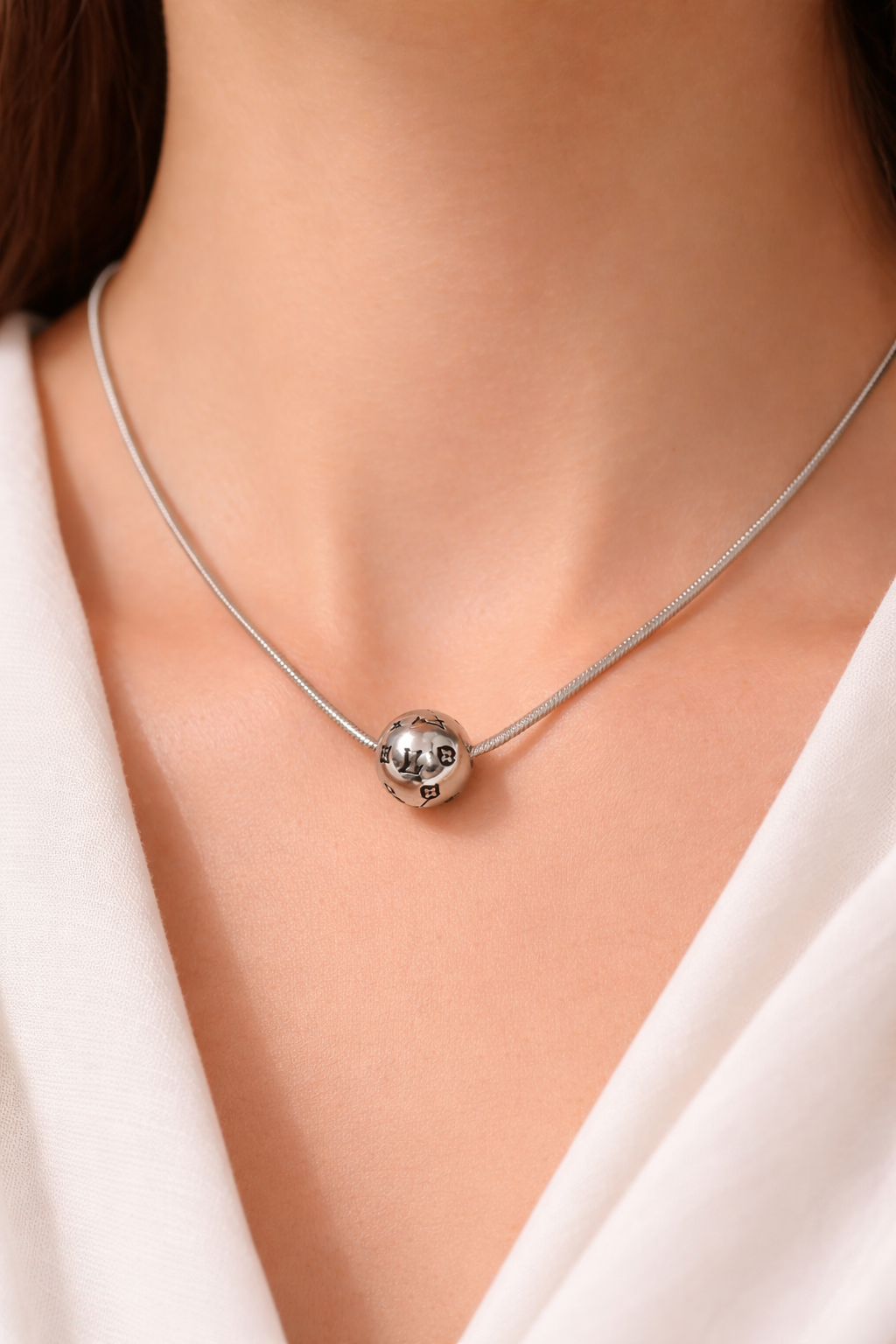Silver Ball Necklace with Luxury-Inspired Print Design