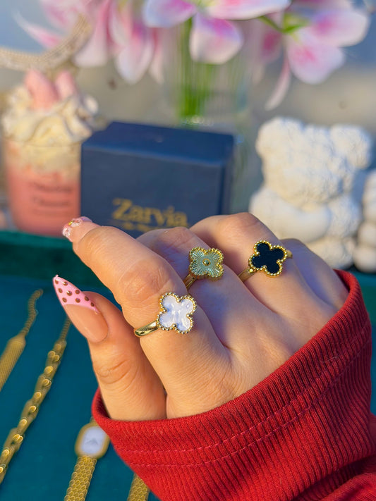 Charming Gold Clover Ring with Black Enamel Accent