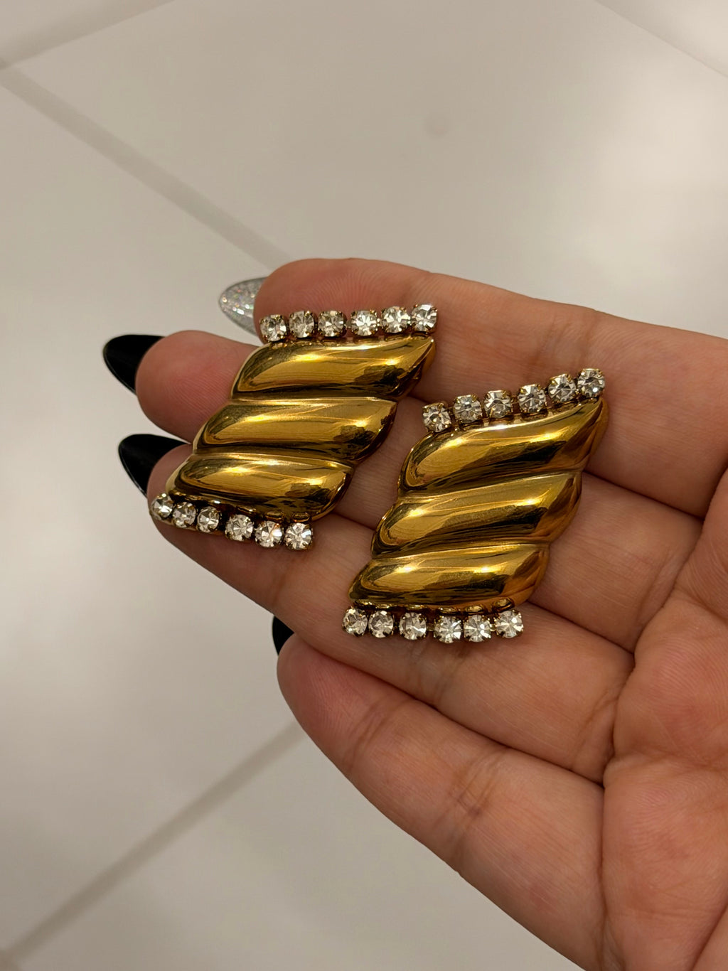 Statement Gold Earrings – Modern Twist Design