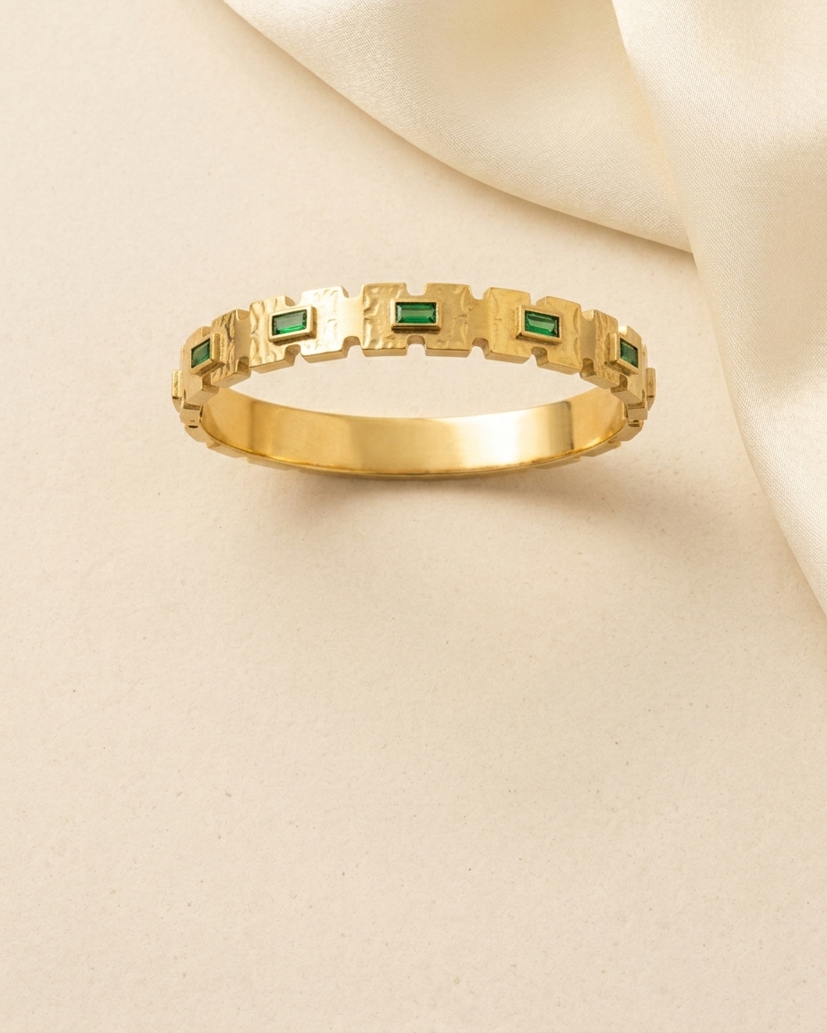 Chic Gold Bracelet with Emerald Tone Stones