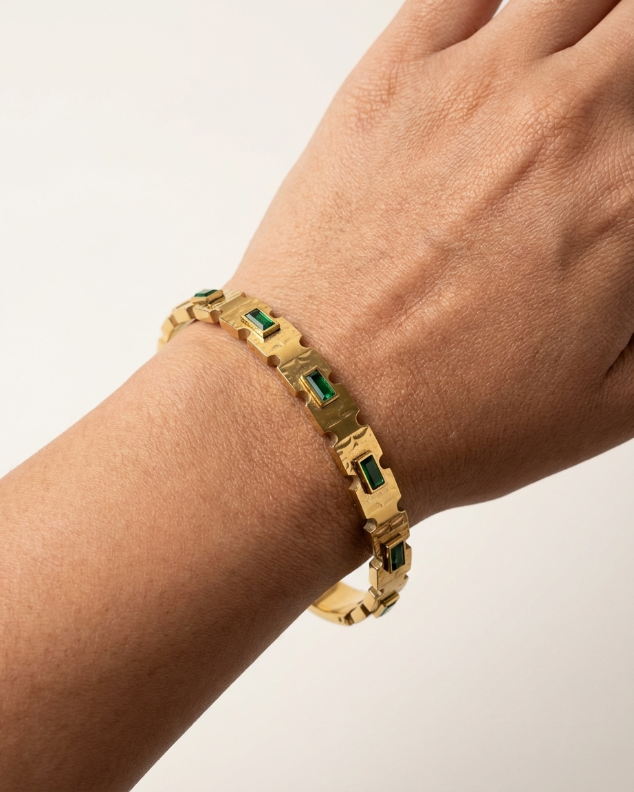 Chic Gold Bracelet with Emerald Tone Stones