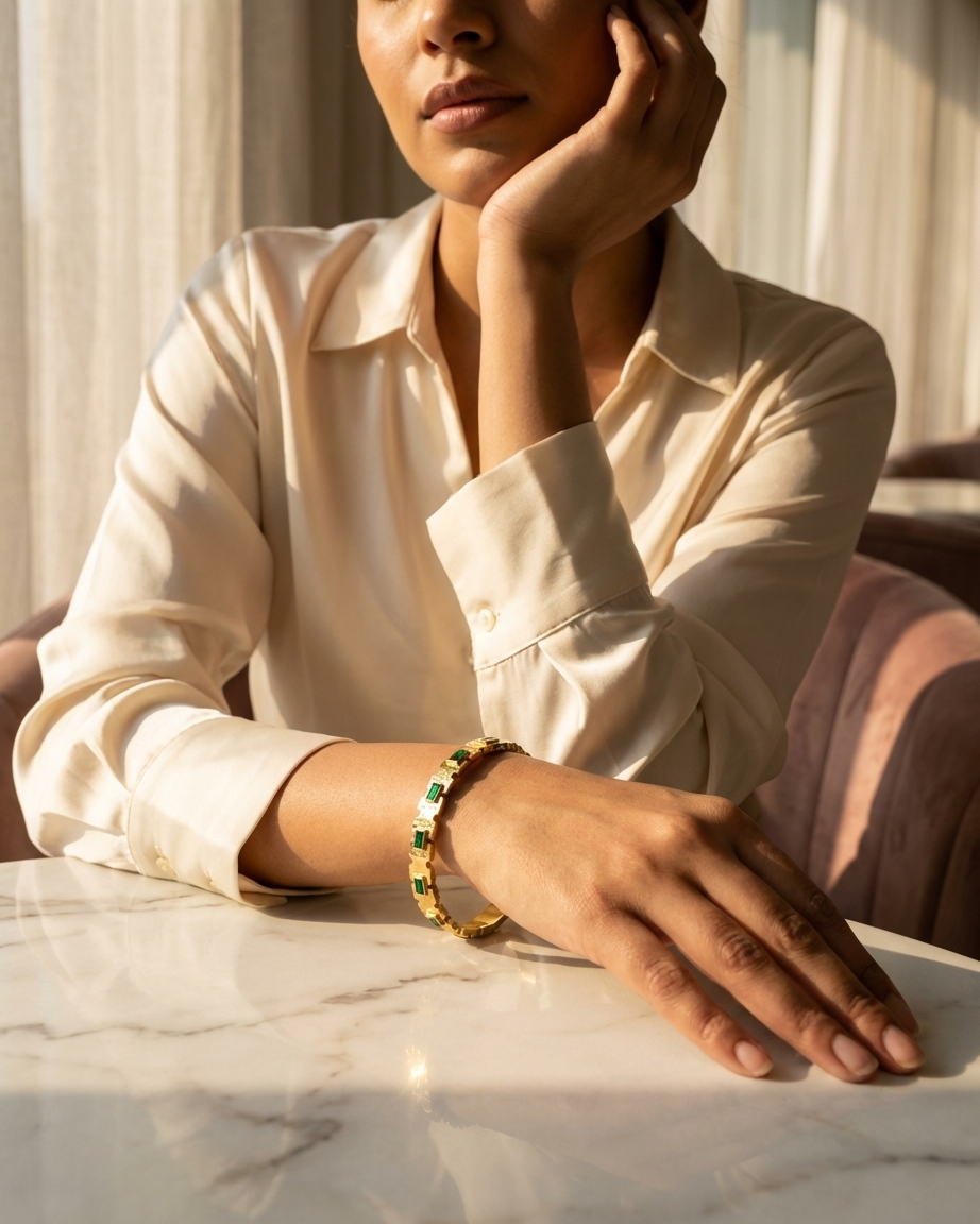 Chic Gold Bracelet with Emerald Tone Stones