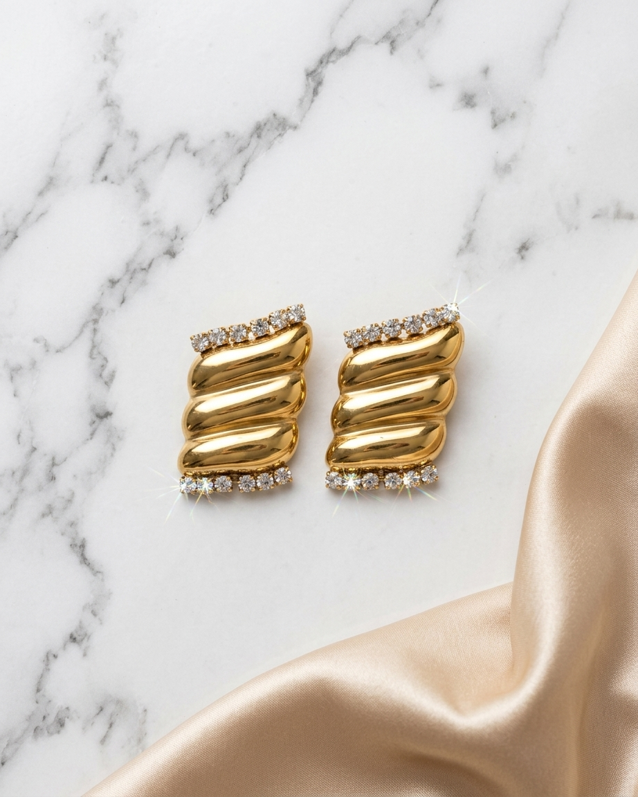 Statement Gold Earrings – Modern Twist Design