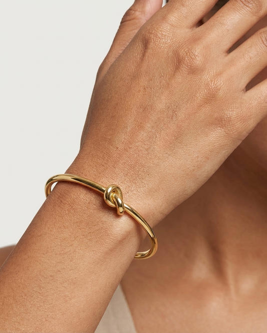 Sleek Gold Knot Cuff Bangle
