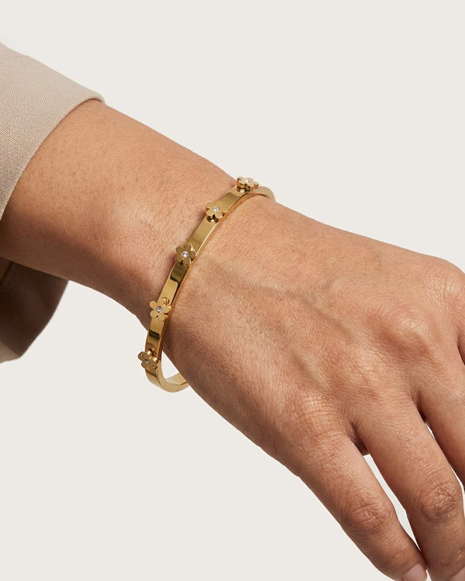 Elegant Gold Floral Bangle with Diamond Accents