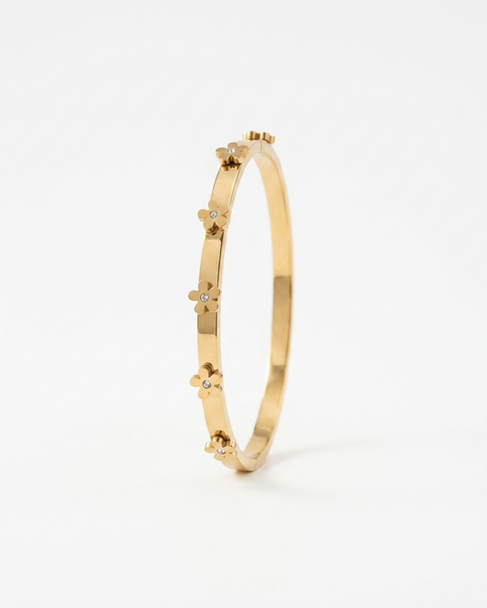 Elegant Gold Floral Bangle with Diamond Accents