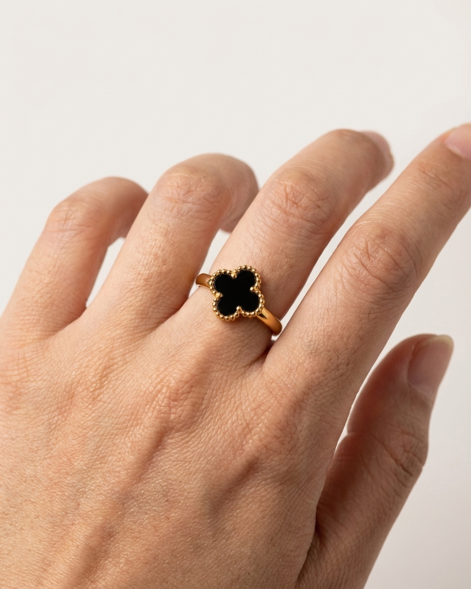 Charming Gold Clover Ring with Black Enamel Accent