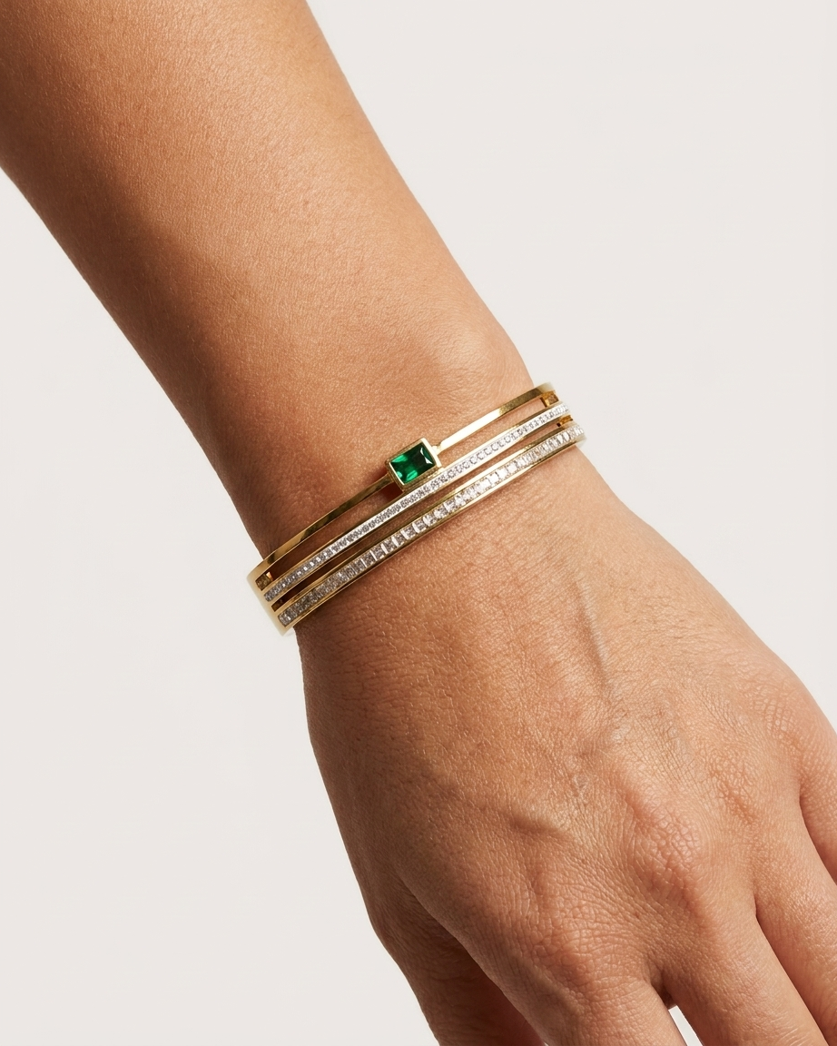 Luxury Gold Stainless Steel Bangle with Emerald Accent