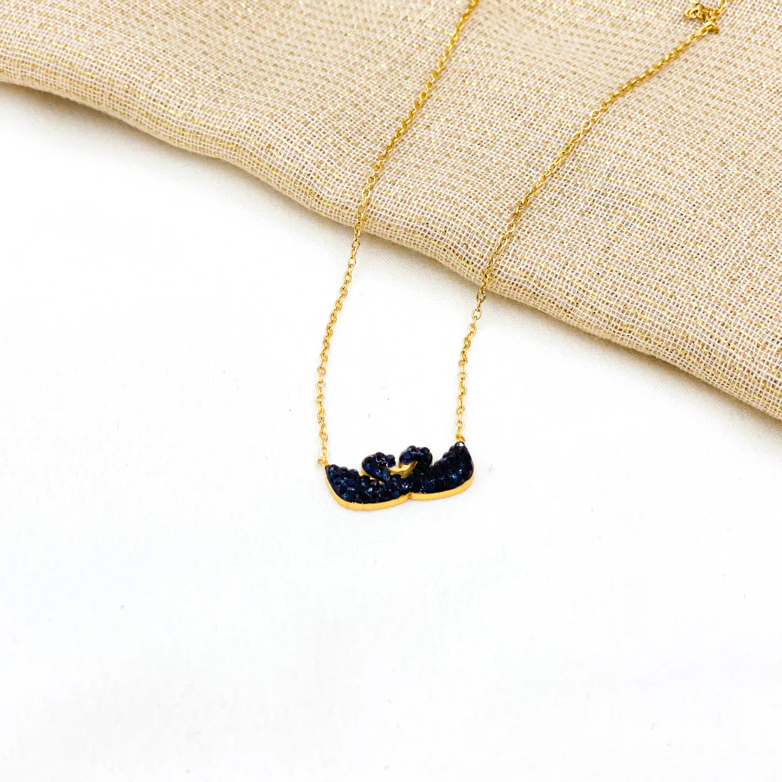 Elegant Golden Necklace with Two Black-Stone Doves