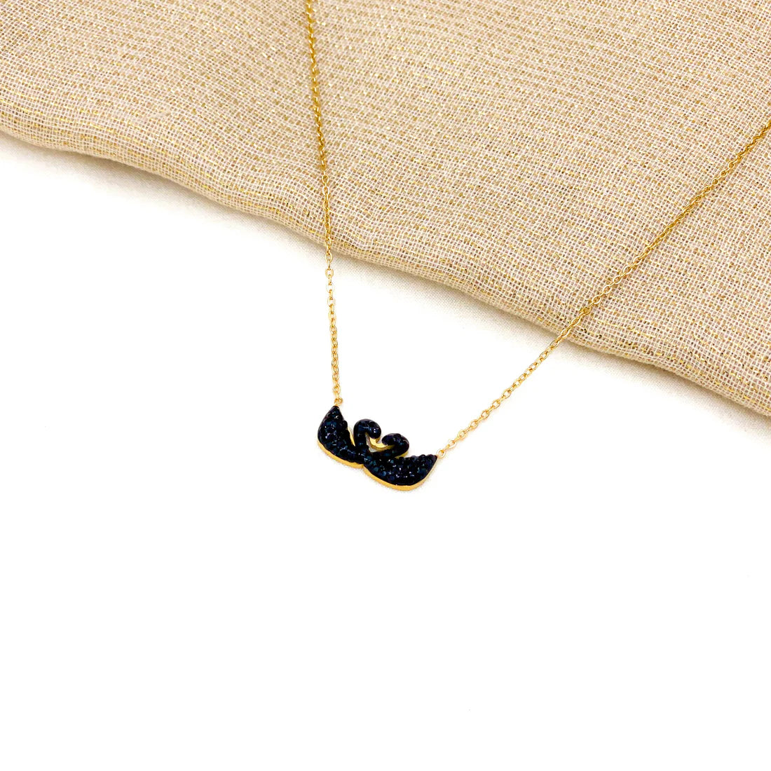 Elegant Golden Necklace with Two Black-Stone Doves